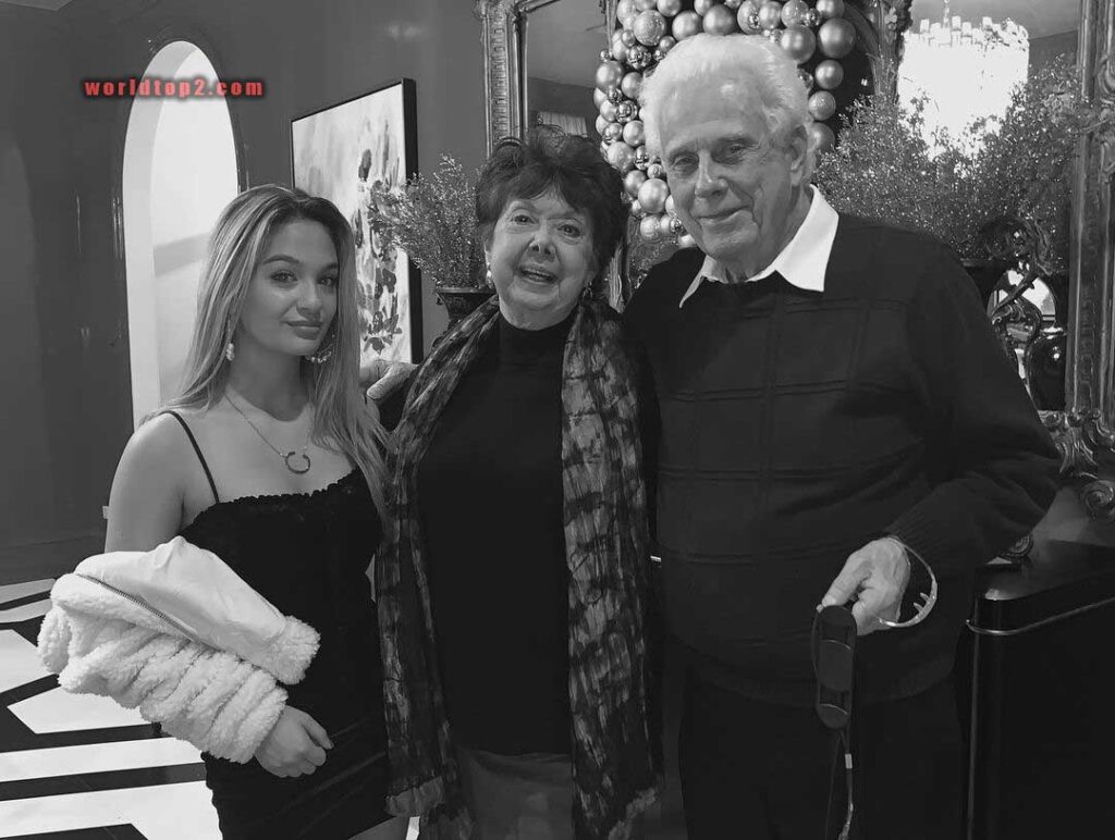 Claudia Conway with her grand father and grand mother