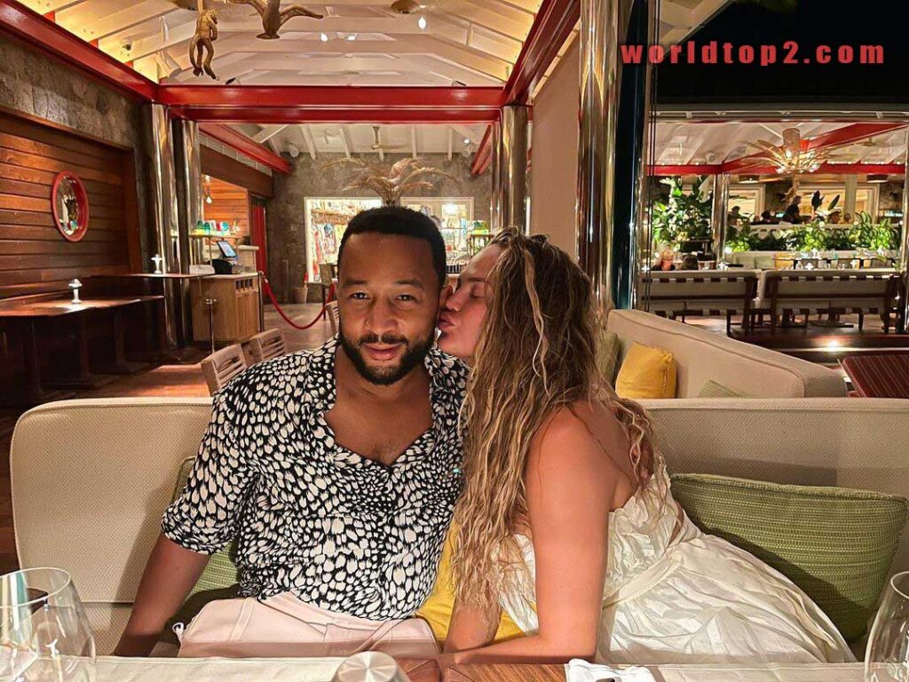 Chrissy Teigen with her husband