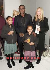 Kirsty Handy with her daughters and husband