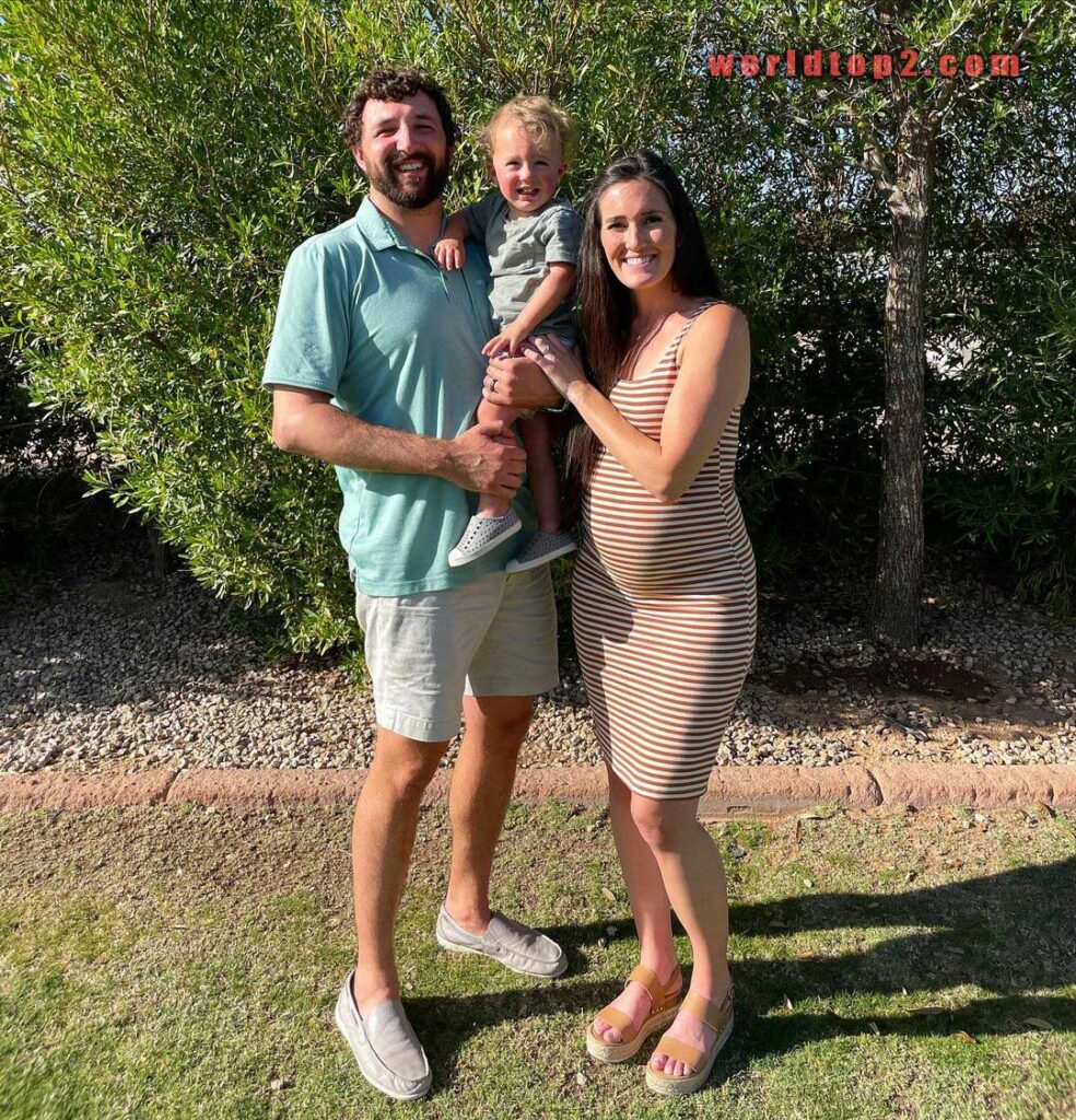 Dawson Gurley with his wife and son