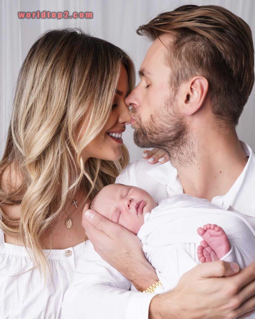 Aferdita Dreshaj Kindl with her husband and son