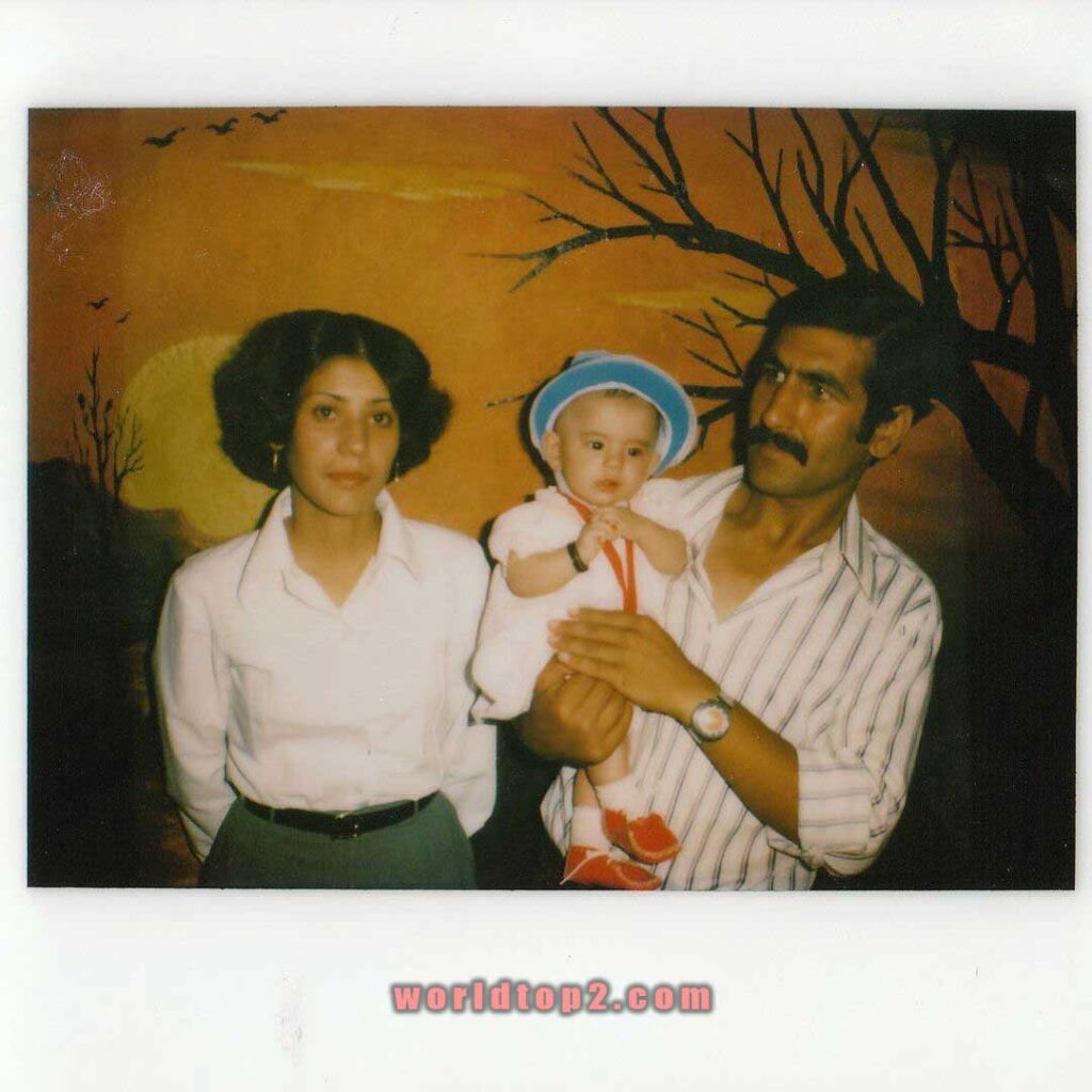 Khatira Rafiqzada with her father and mother when she was child