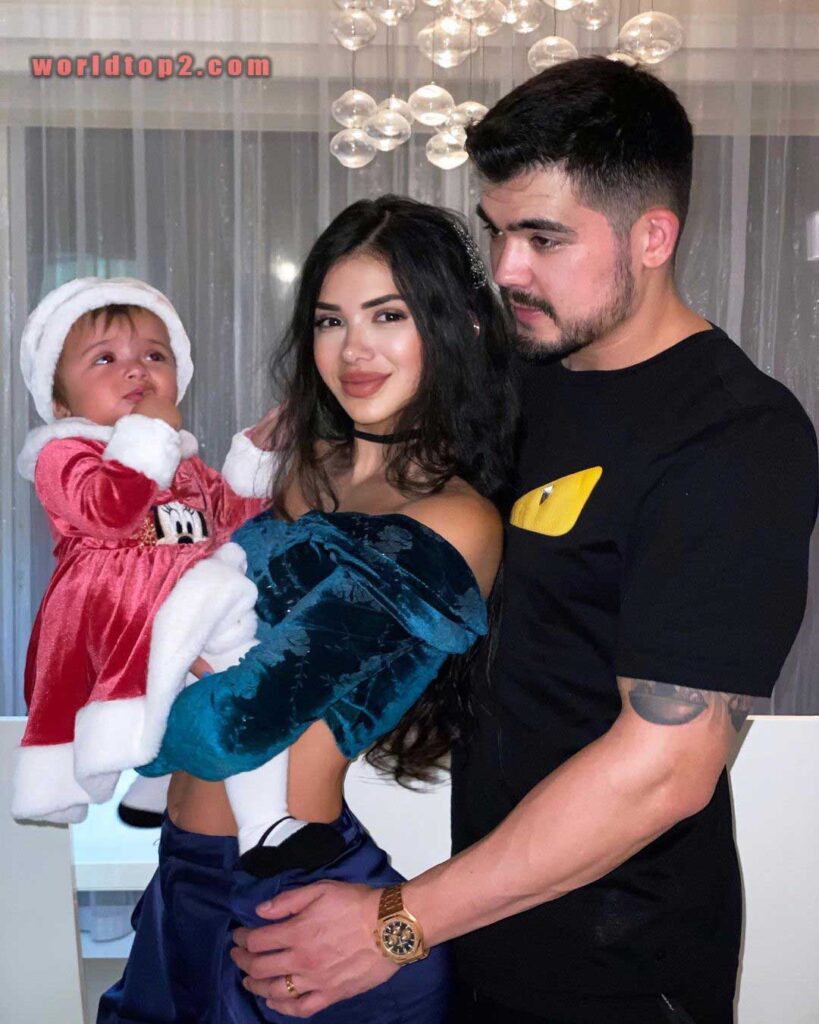 Paula Suarez with her husband and daughter