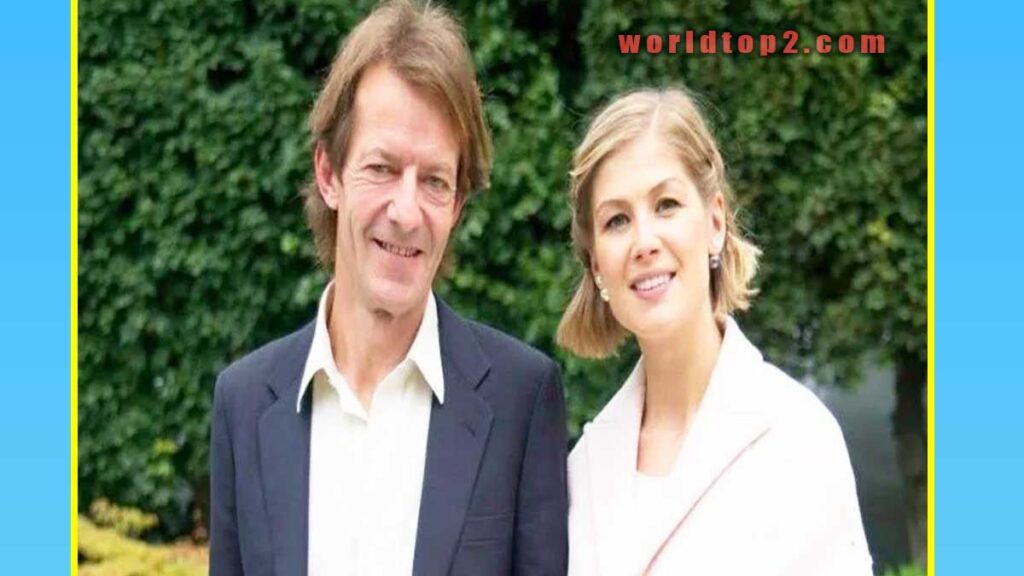 Robie Uniacke with his wife Rosamund Pike