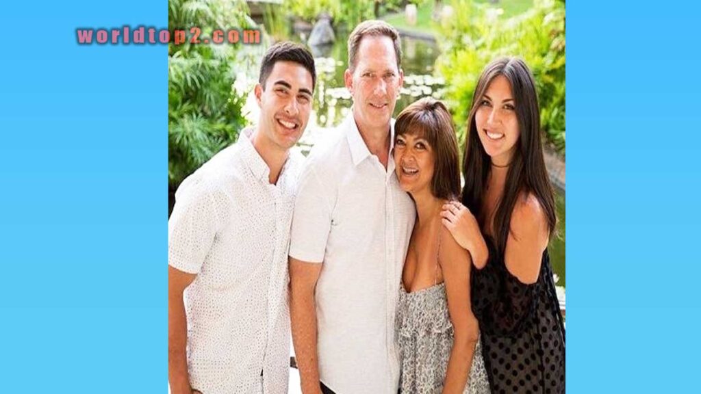 Sydnee Goodman with her parents and brother