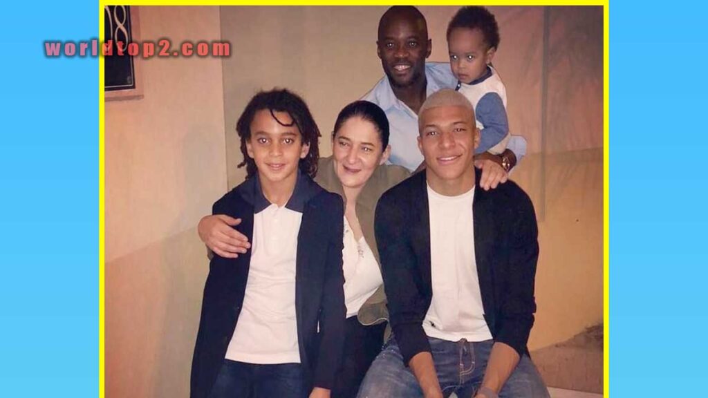 Kylian Mbappé with his parents and siblings
