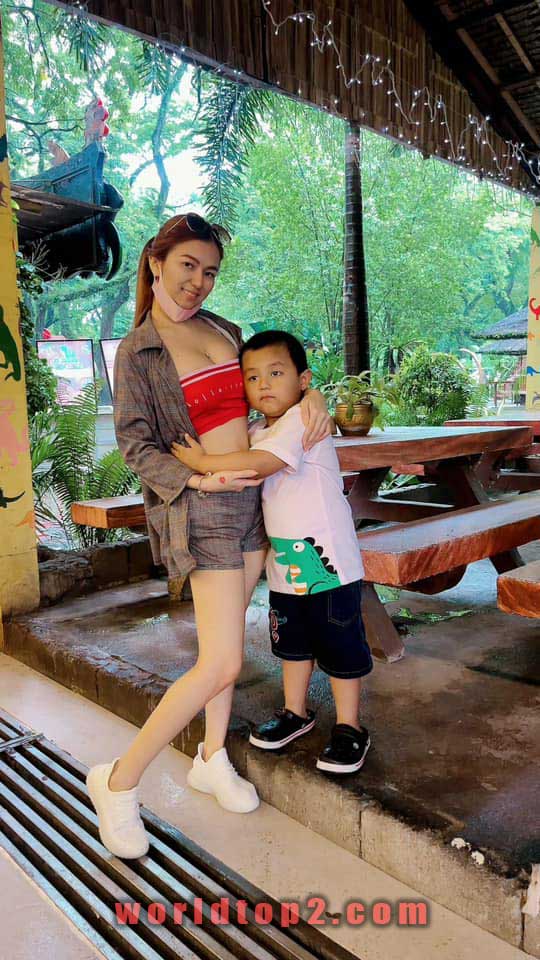 Apple Angeles with her son