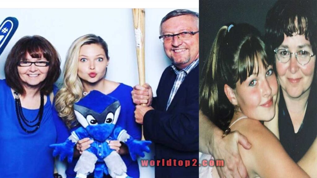 Ashley Smouter with her father and mother