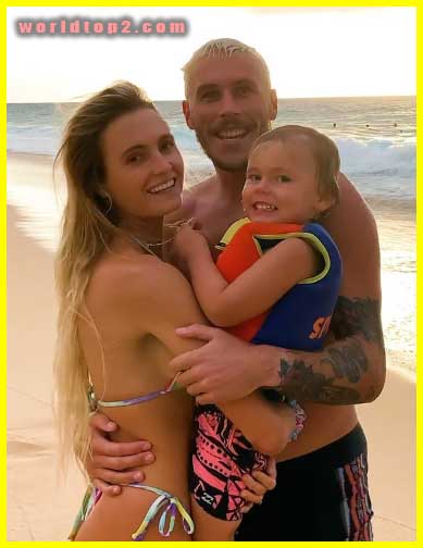 Alana Blanchar with her son and husband