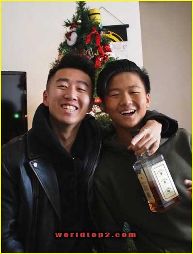 Jimmy Zhang with his brother
