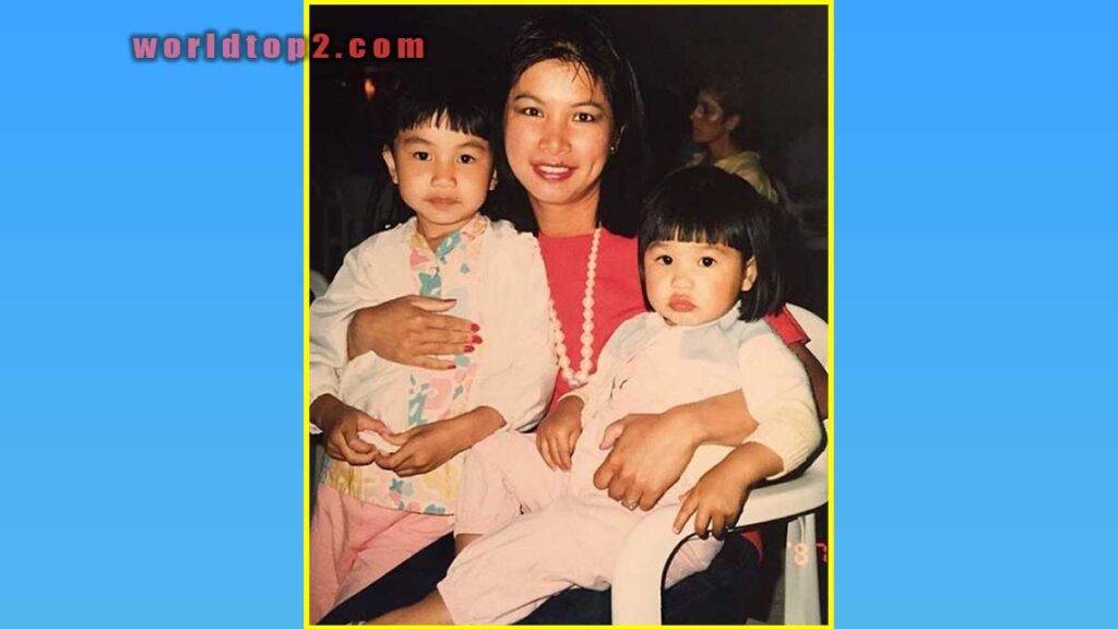 Gemma Chan with her mother and sister