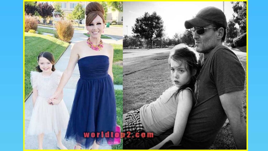 Violet McGraw with her father and mother