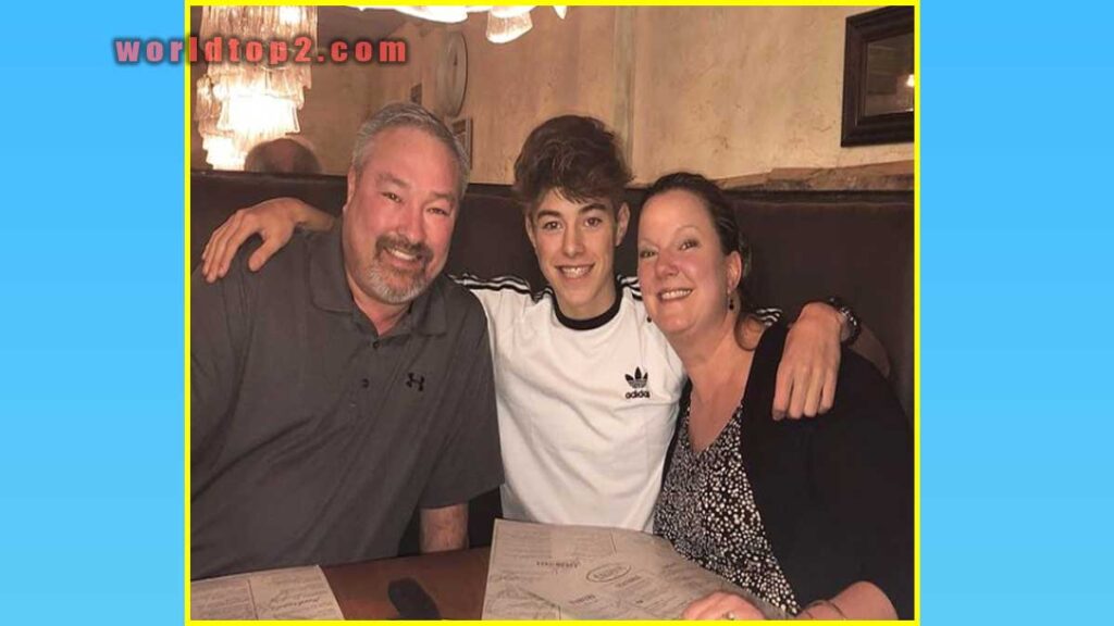 Jeremy Hutchins with his father and mother