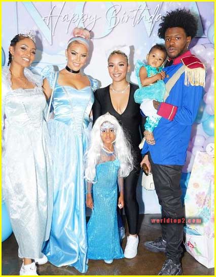 Brittney-Elena with godkids and their parents