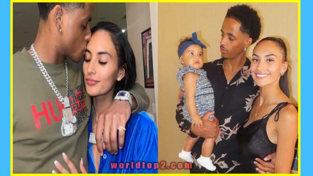 Cordell Broadus with his wife and daughter