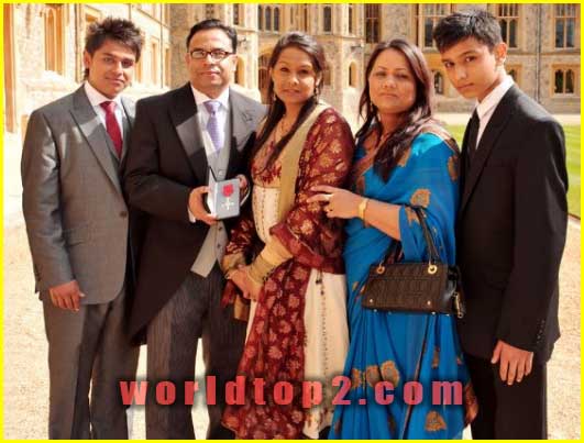 Enam Ali with his wife and children