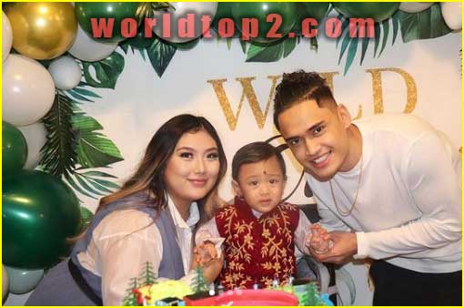 with her husband and son