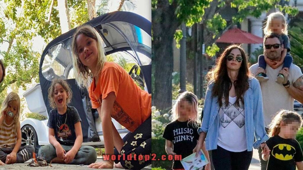 Journey River Green with his parents and brothers