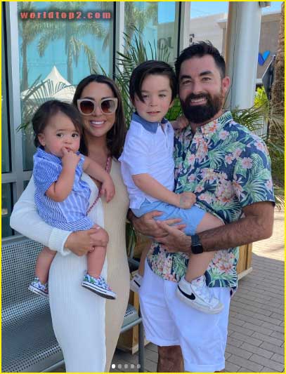 Alexandrea Garza with her husband and son