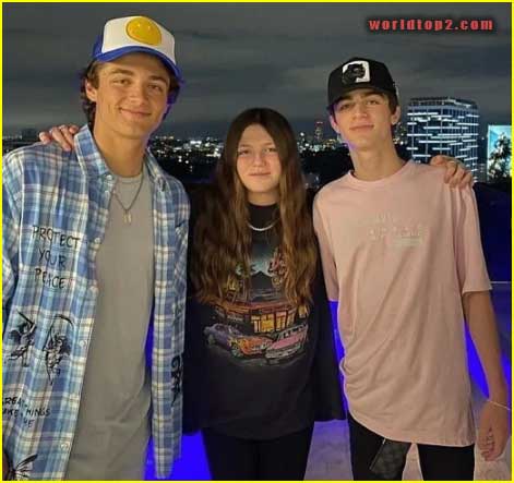 Avi Angel with his brother and sister