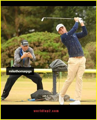 Justin Thomas with his father