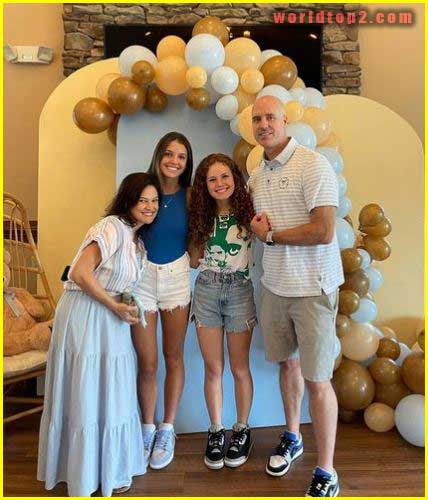 Darby Eliza Camp with her sister and parents