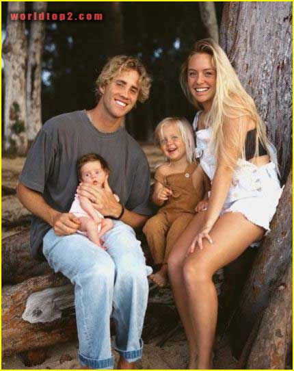 Derik Beeston with his wife and children