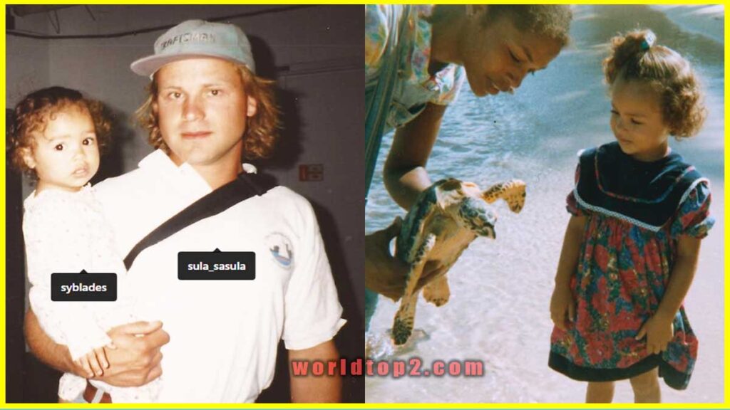 childhood photo with her father and mother