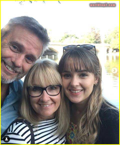 Molly Wright with her father and mother