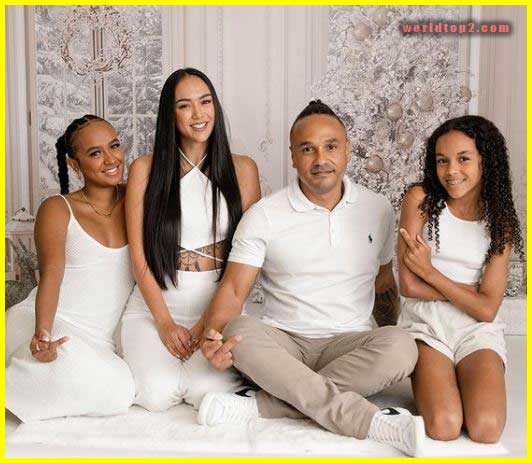 Kat Zoe Clark with her husband and daughters