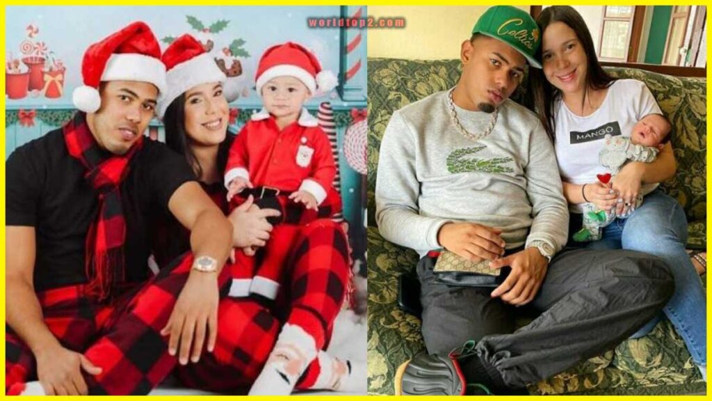 Myke Towers with his wife and son