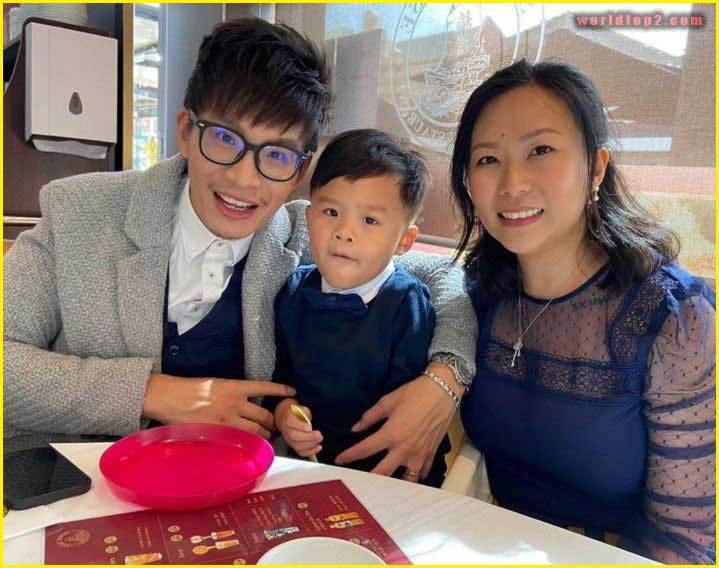 Vinh Giang with his wife and son