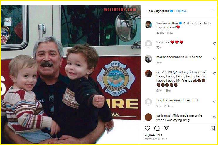 Zackary Arthur childhood photo with his brother and father