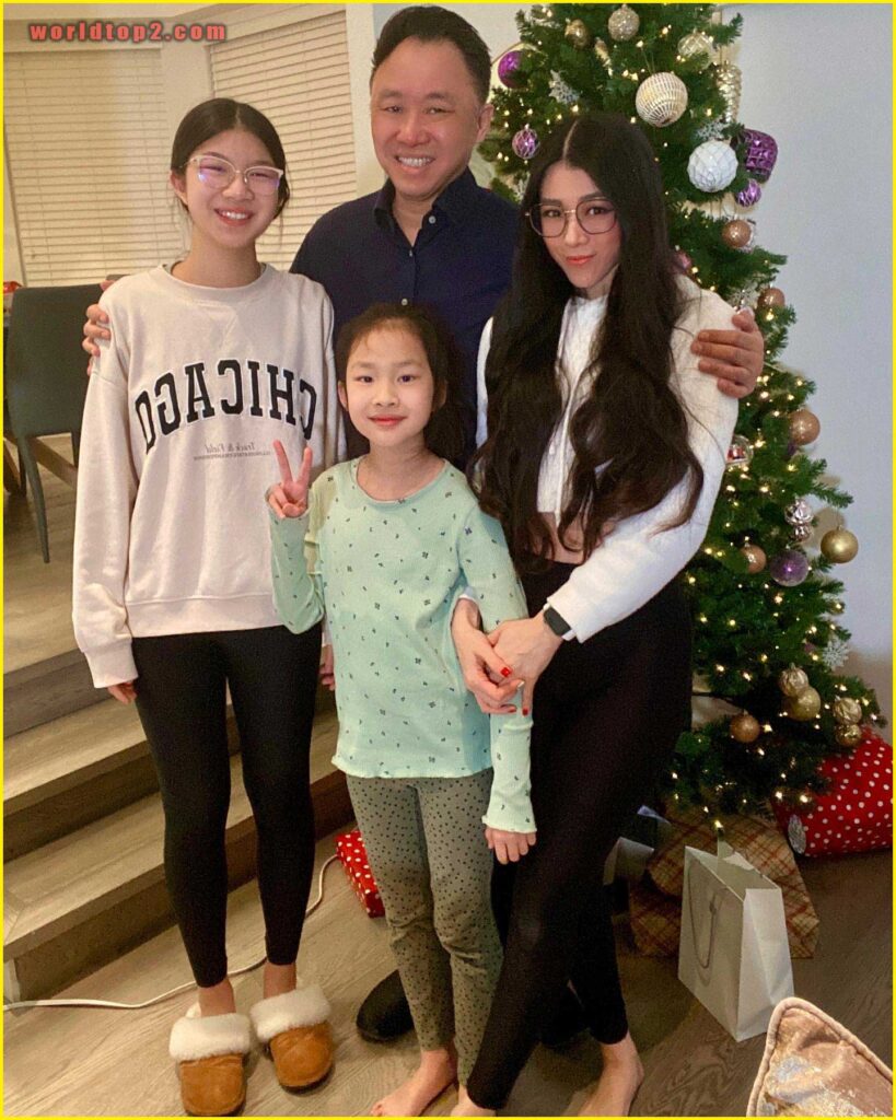 Linda Yu Qian with her husband and daughters